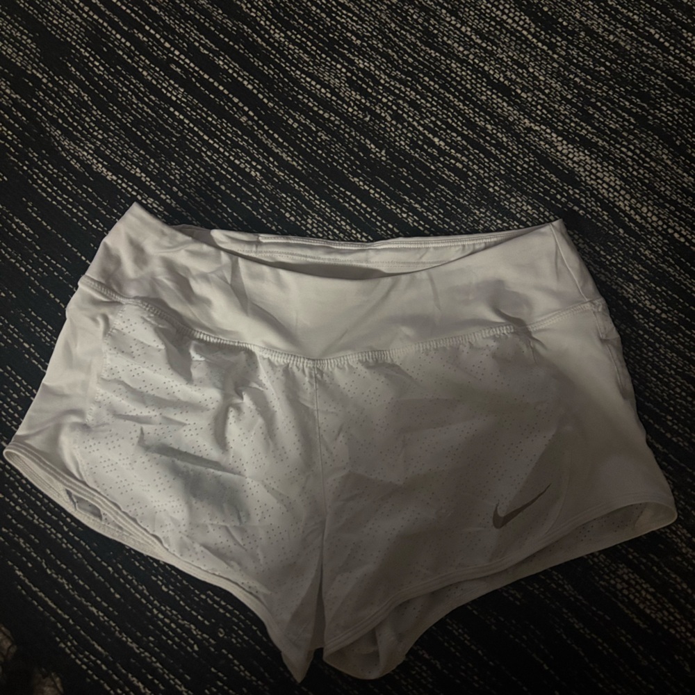 White Nike shorts